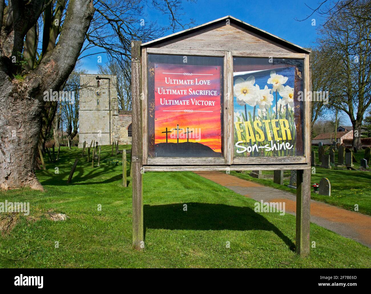 Easter notices displayed outside St Cuthbert's Church, in the village of Burton Fleming, East Yorkshire, England UK Stock Photo