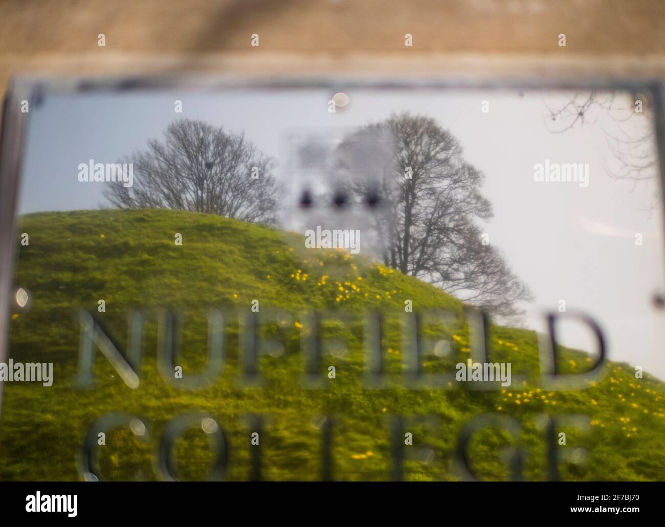 Castle Mound, Oxford Castle, Reflected in Nuffield College, University of Oxford, Oxfordshire, England. UK, GB. Stock Photo