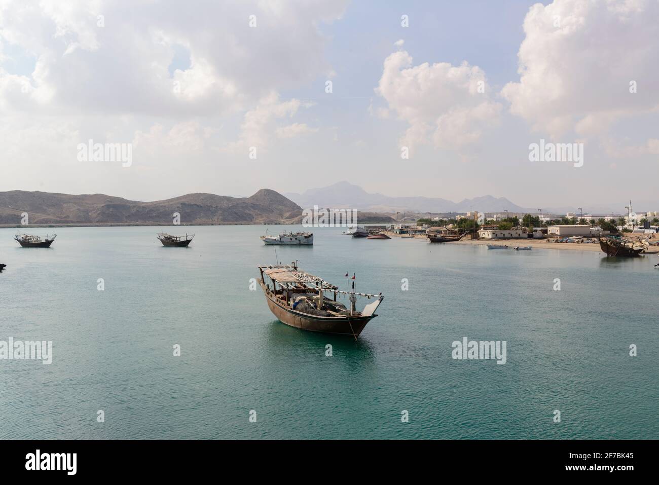 Anchored dhows in the lagoon of city Sur, Oman. Stock Photo