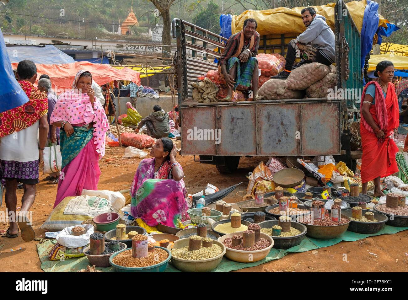 Kunduli, India - February 2021: Women selling vegetables and spices in the Kunduli market on February 19, 2021 in Kunduli, Odisha, India. Stock Photo