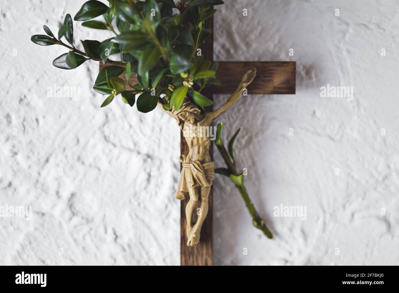 box tree branch on a crucifix, Austria Stock Photo