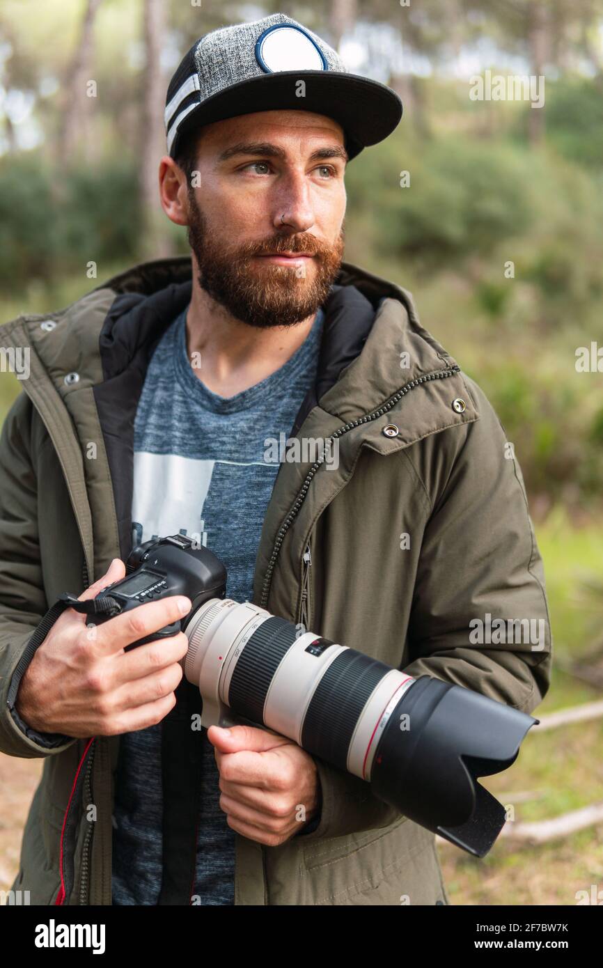 Man Taking Photos Using a Camera · Free Stock Photo