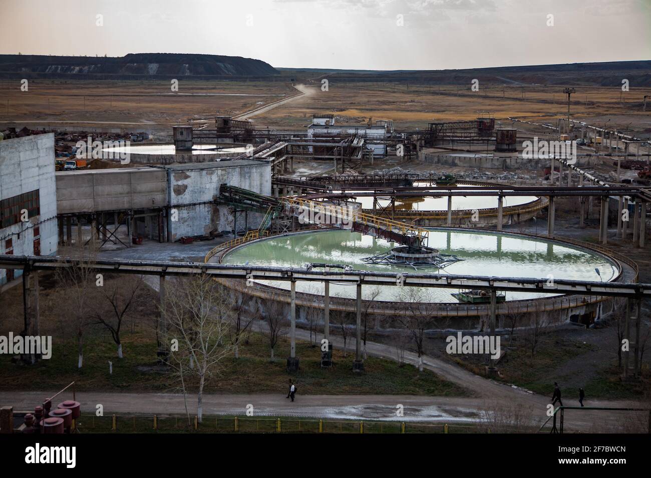 Outdated Soviet mining and processing factory. Water purification plant. Panorama view. Stock Photo