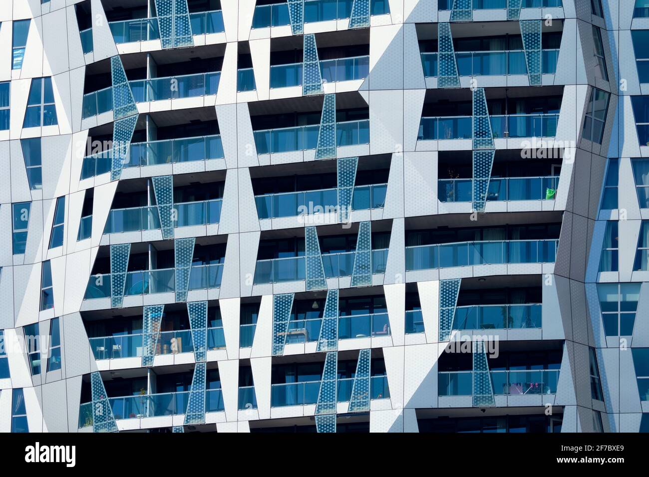 Modern residential building facade with windows and balconies ...