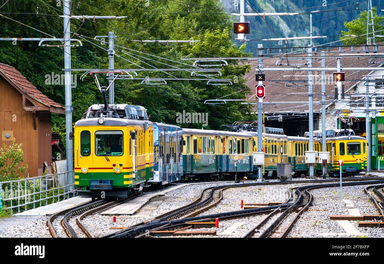 Mountain trains at Lauterbrunnen railway depot in Switzerland Stock Photo