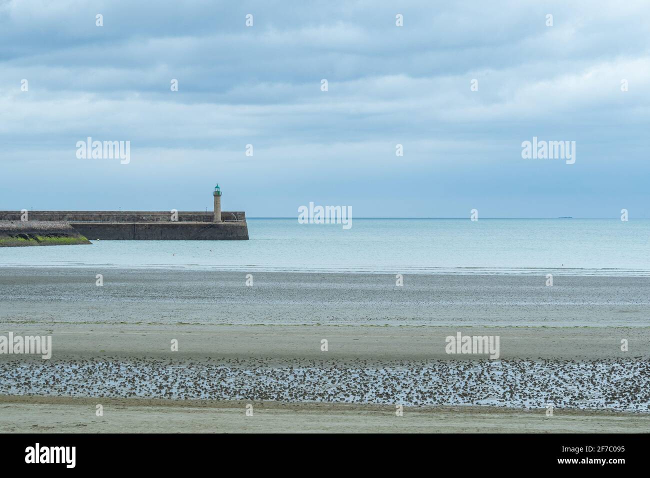 Beautiful beach at the Brittany Atlantic coast, France, with wave-breaker. Stock Photo