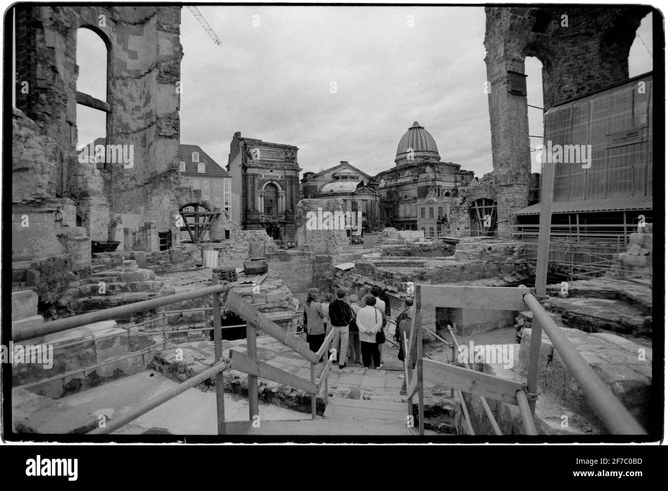 Dresden Eastern Germany after reunification 1994 Seen here The ruins of the Dresden Frauenkirche destroyed during bombing in February  1945 being prepared for reconstruction. The Dresden Frauenkirche  Church of Our Lady is a Lutheran church in Dresden, the capital of the German state of Saxony.  Built in the 18th century, the church was destroyed in the bombing of Dresden during World War II. The remaining ruins were left for 50 years as a war memorial, following decisions of local East German leaders. The church was rebuilt after the reunification of Germany, starting in 1994. The reconstruct Stock Photo