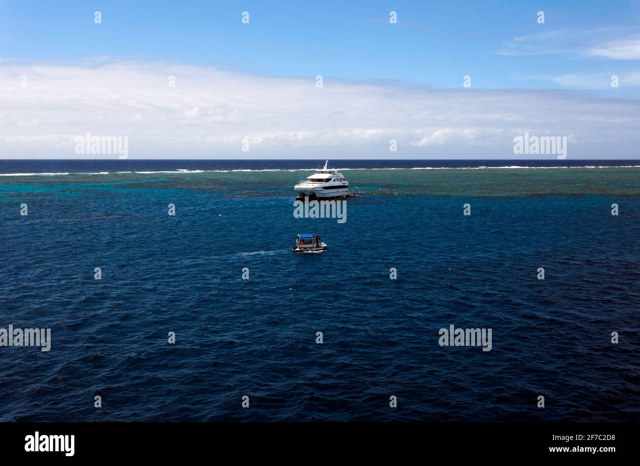 Aerial view of the Evolution Catamaran and shuttle boat, operated by the Down Under Cruise and