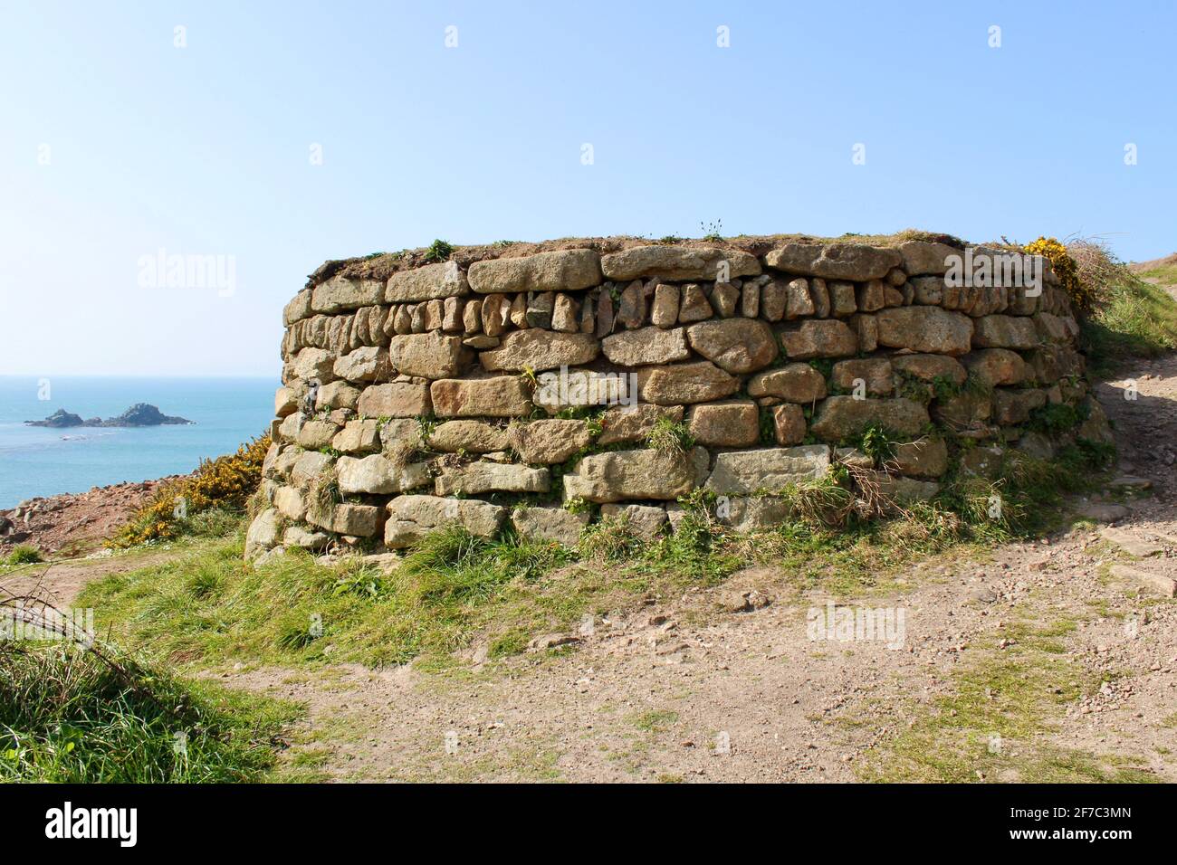 Wall around a disused mine shaft on the South West Coastal Path near cape Cornwall, St Just, Cornwall England. Stock Photo