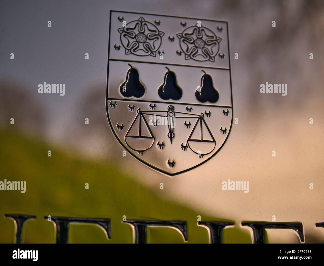 Reflection of Castle Mound, in Nuffield College Name Plaque, Nuffield College, University of Oxford, Oxfordshire, England, UK, GB. Stock Photo