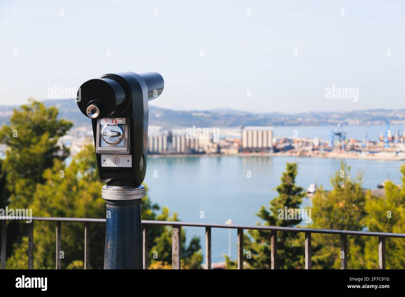 Sightseeing tourist coin operated telescope at watching point with scenic view at the port of Ancona, Italy Stock Photo