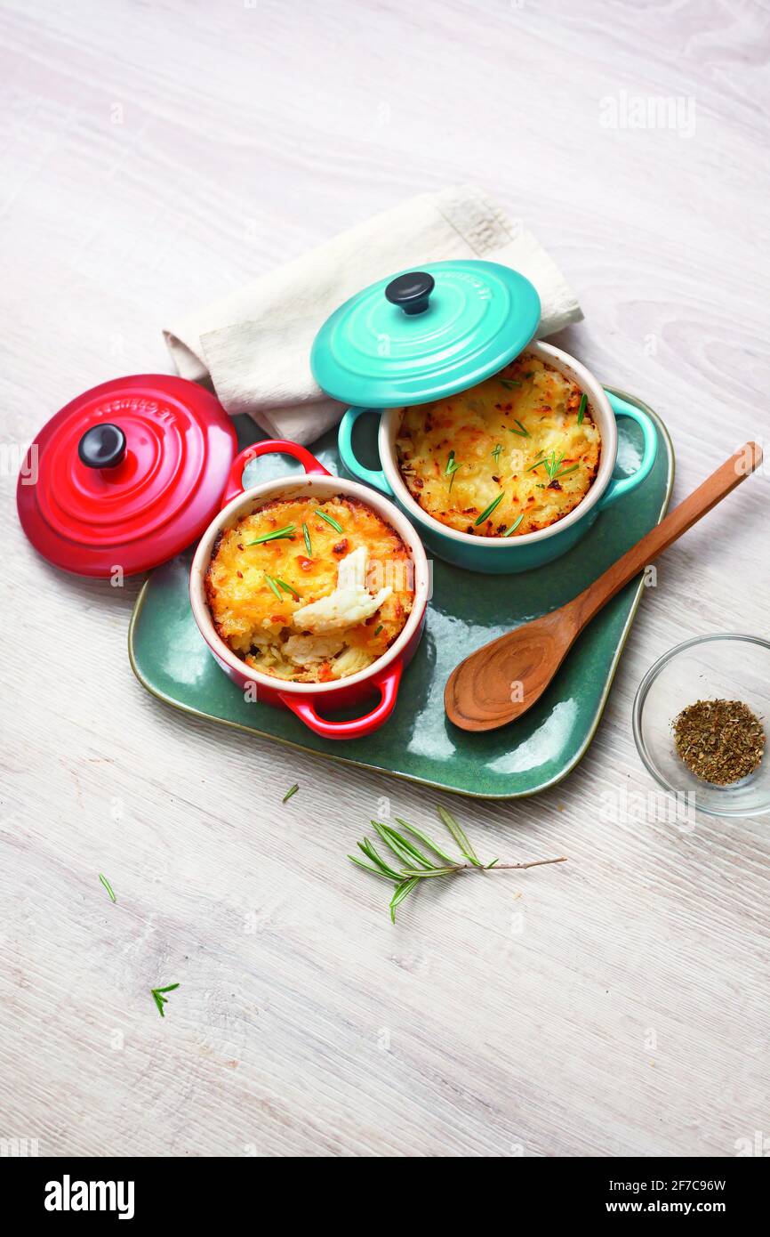 Cod fishcakes with potatoes and rosemary Stock Photo
