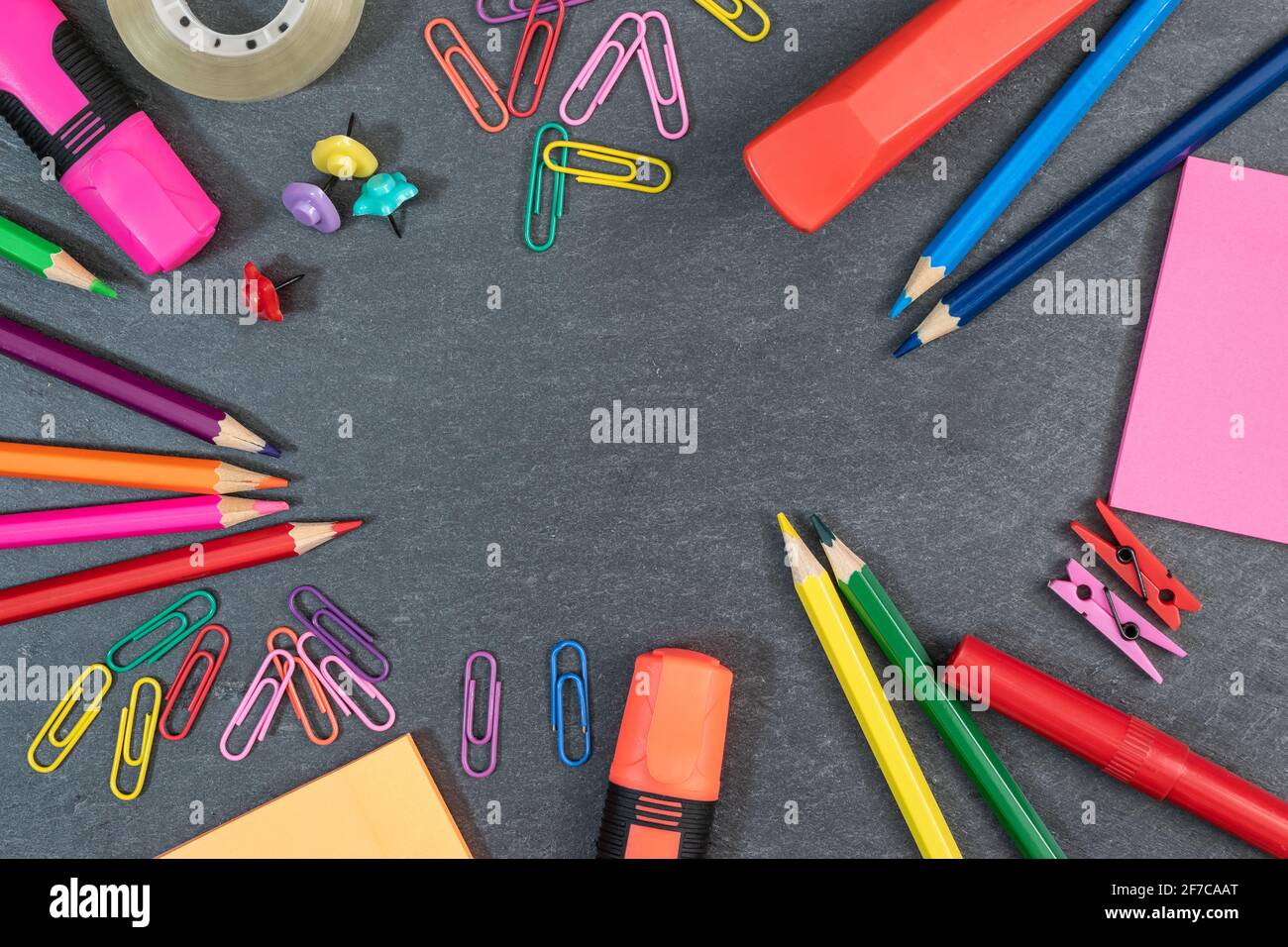 Border Frame of Colored School Object on Grey Background Stock Photo