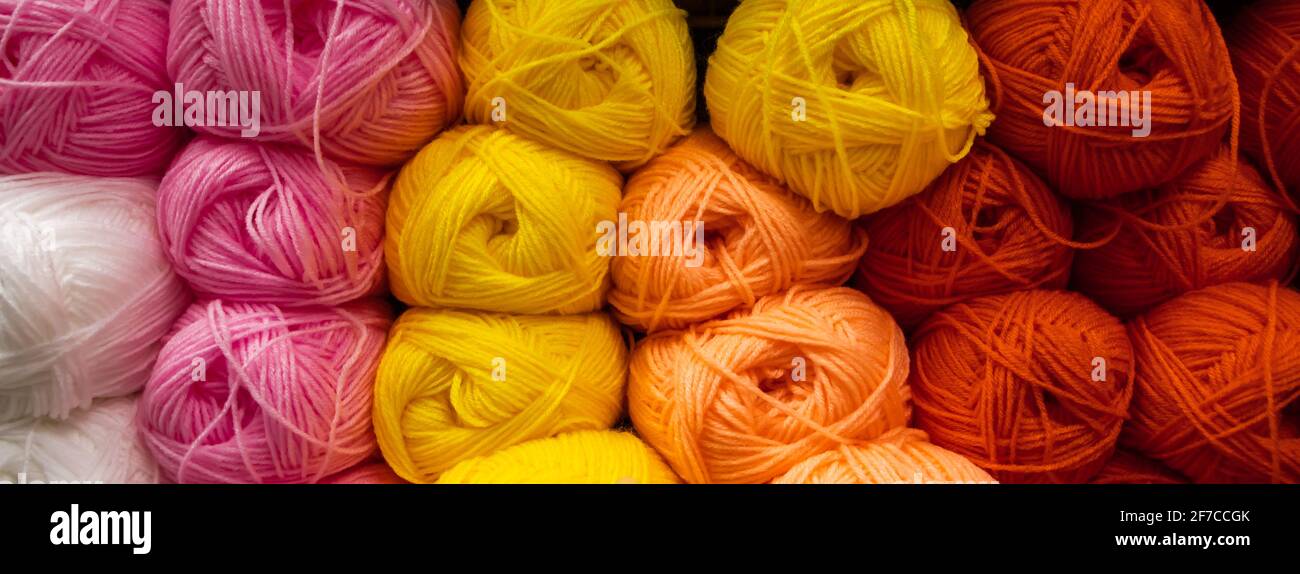 Background from multi-colored fluffy woolen threads for knitting ...