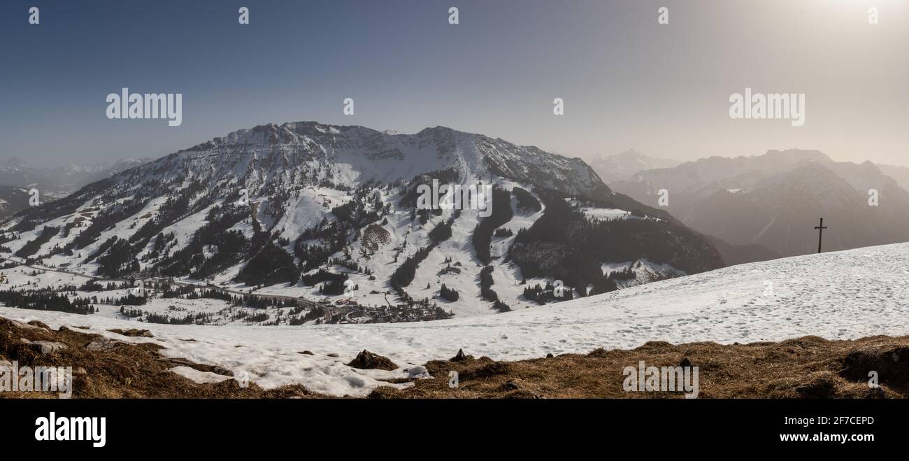 Sunny weather in the snowy mountains Stock Photo