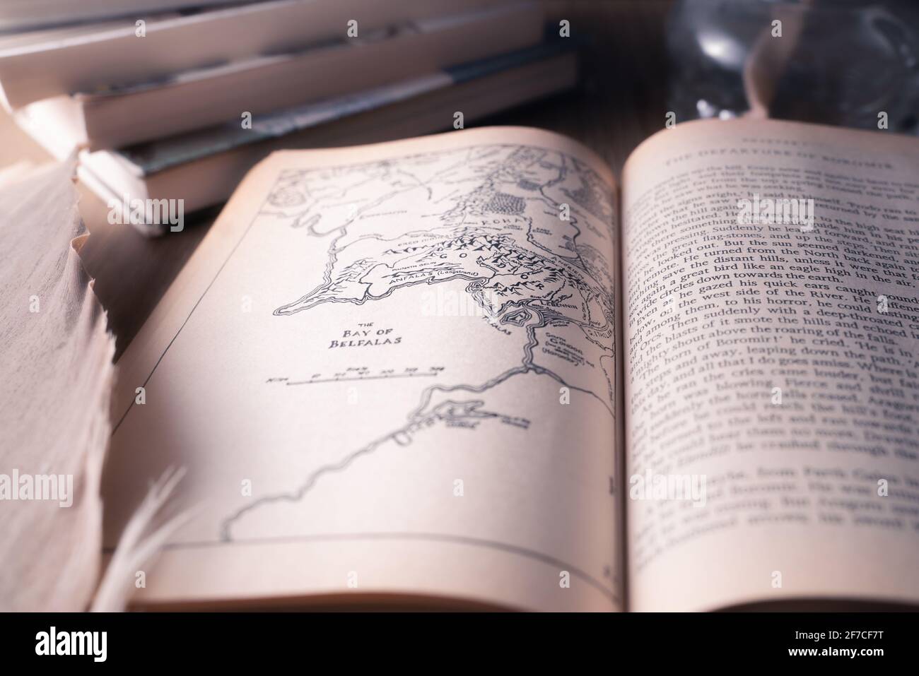 Celadna, Czechia - 04.03.2021: Vintage paperback edition of Tolkien's Lord Of The Rings open on the page with Middle-earth map focused on Bay of Belfa Stock Photo