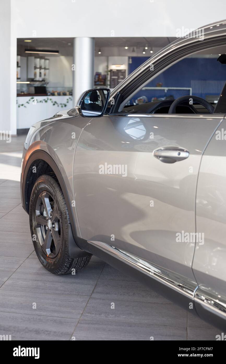 Russia, Izhevsk - February 17, 2021: Haval showroom. New modern F7X car. Back view. Cropped image. Car manufacturer from China. Stock Photo