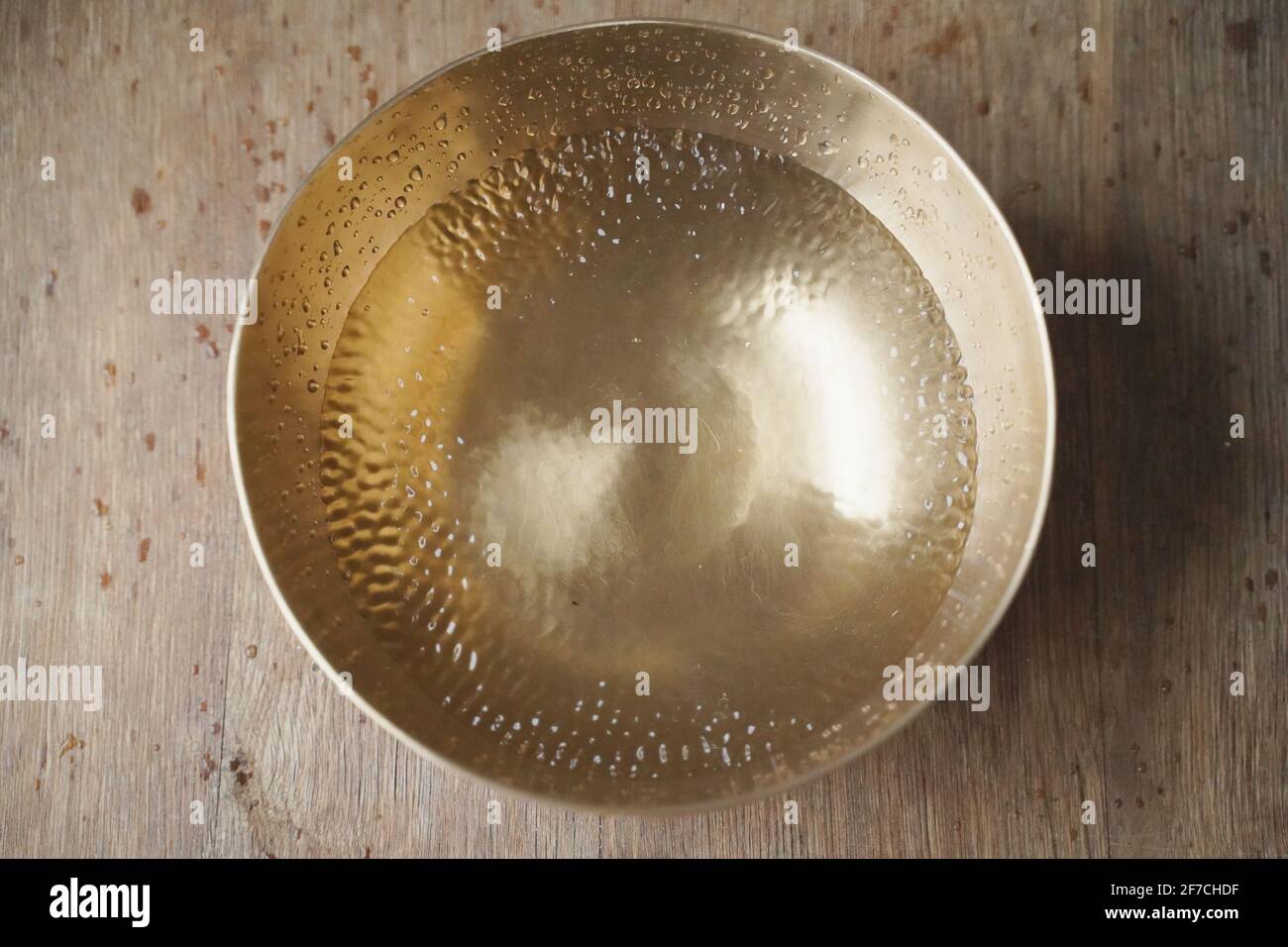 Singing bowl filled with water Stock Photo - Alamy