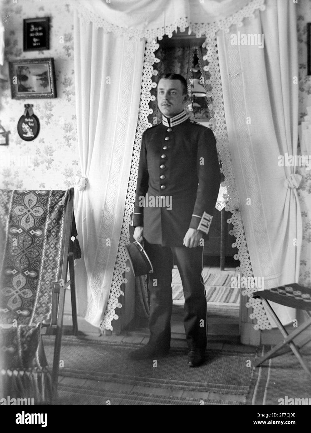 Ernst Axfors collection 21 portrait of an army soldier from in 4 or in 5 regiment standing at a door indoors Stock Photo