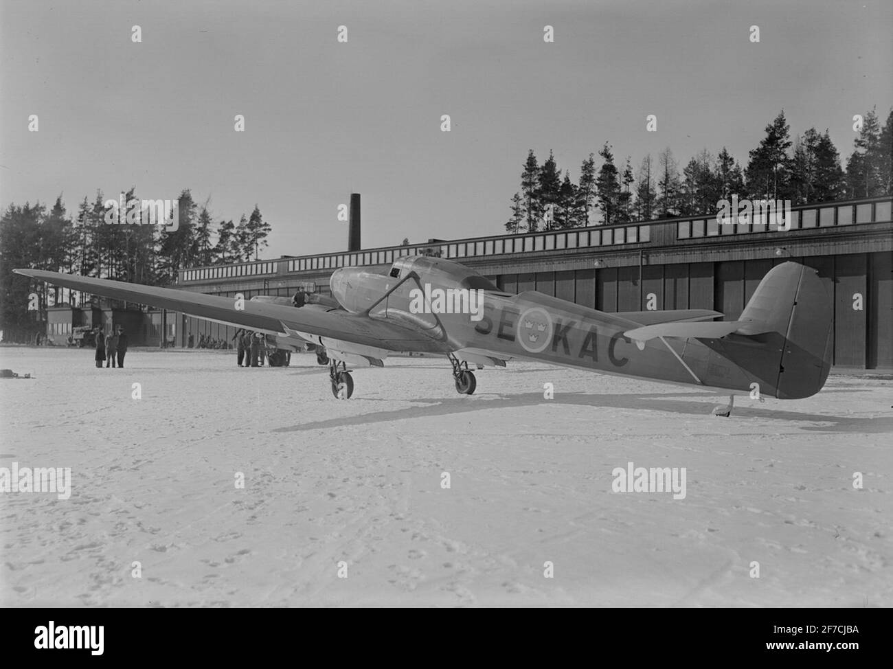 Pharmacies Airplane Type P 6, 1944  The map of the map P 6 with registration designation SE-KAC, winter time. The aircraft seen obliquely from the side. Building in the background. Stock Photo