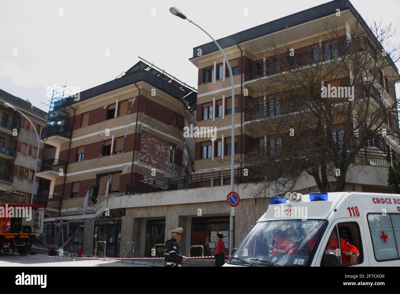 L'Aquila, Italy - April 6, 2009: The Fire Brigade in front of the student house trying to extract alive the boys trapped in the rubble Stock Photo