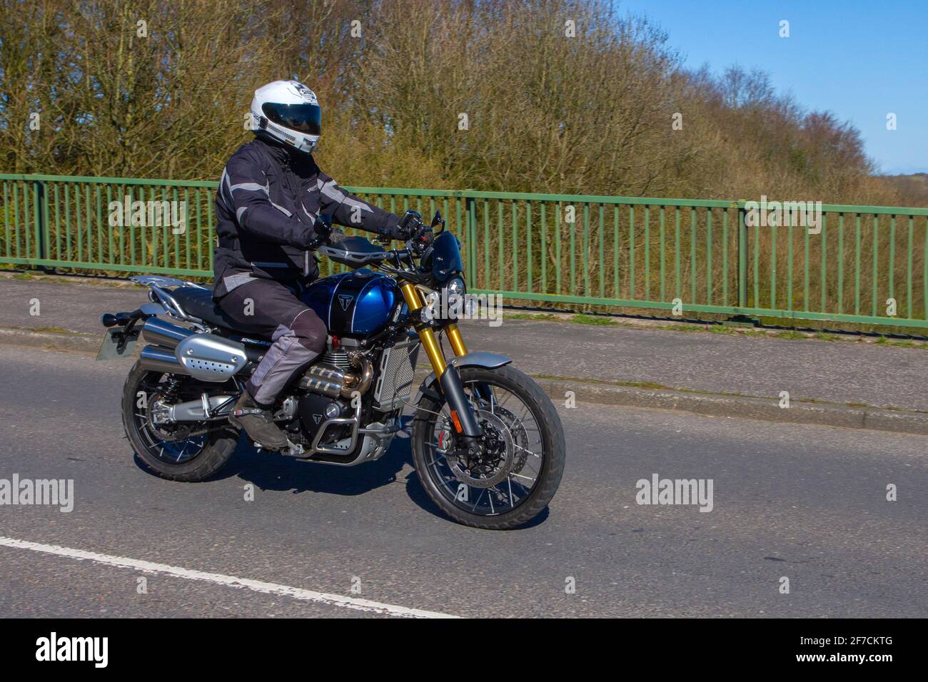 2020 Triumph Scrambler 1200 Xe; Motorbike rider; two wheeled transport, motorcycles, vehicle on British roads, motorbikes, motorcycle bike riders motoring in Manchester, UK Stock Photo