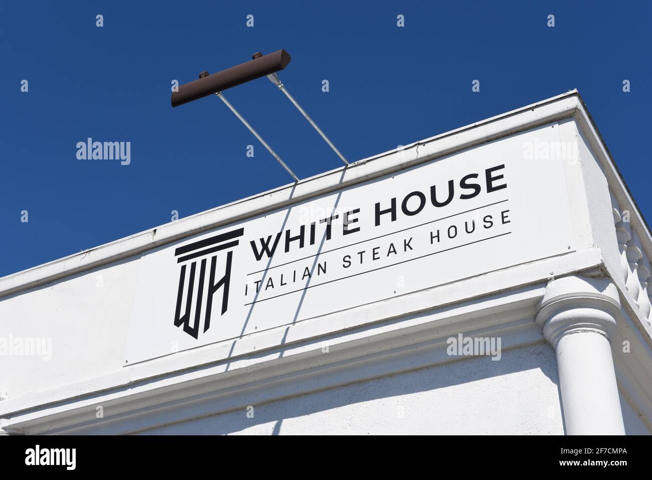 ANAHEIM, CALIFORNIA - 31 MAR 2021: Closeup of the sign on The White House Italian Steak House, by Philanthropist  and Celebrity Chef Sir Bruno Serato. Stock Photo