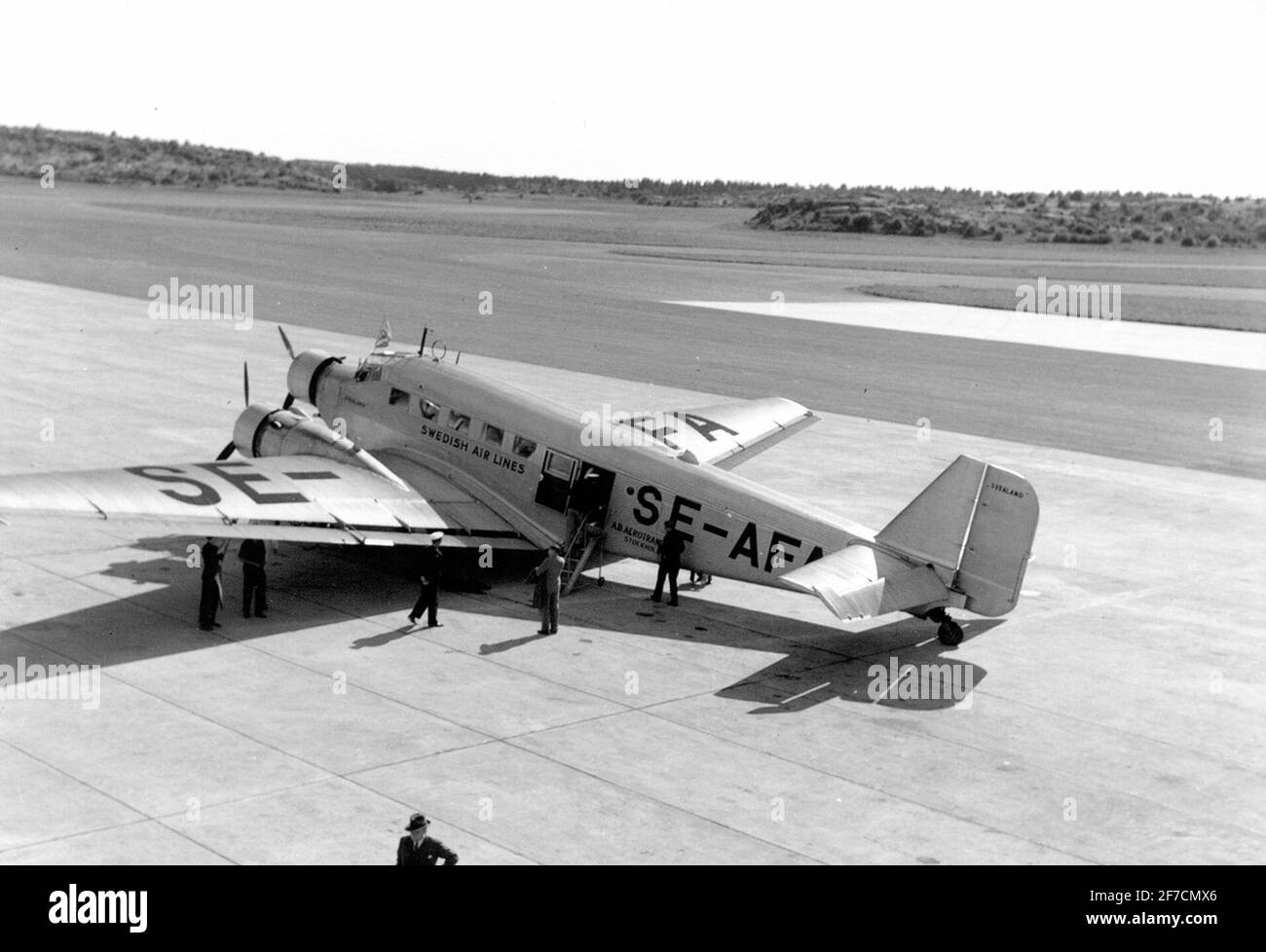 Passenger Airplane Junkers Ju 52 Number SE-AFA at Bromma Airport, 1938 Motiva: The Company Aerotransports Airplane Junkers Ju 52 number SE-AFA from the side of Bromma airport. The image scanned from Alan Granston's album. Only digital file in FVM's ownership. Stock Photo