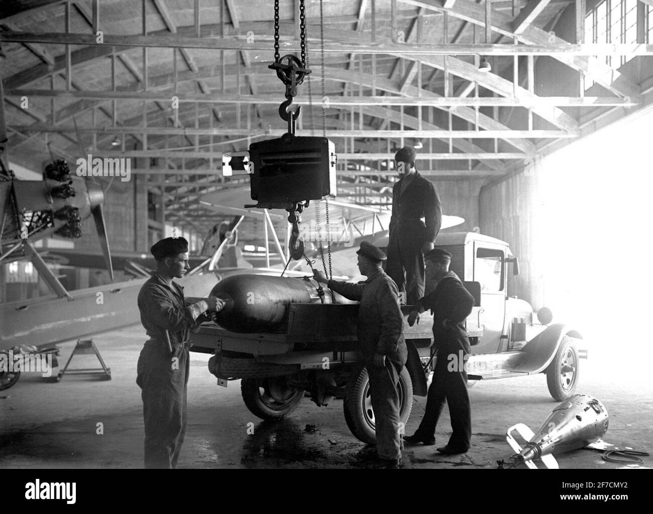Work with bombs in hangar on f 2, 1932.Work with bombs for aircraft in