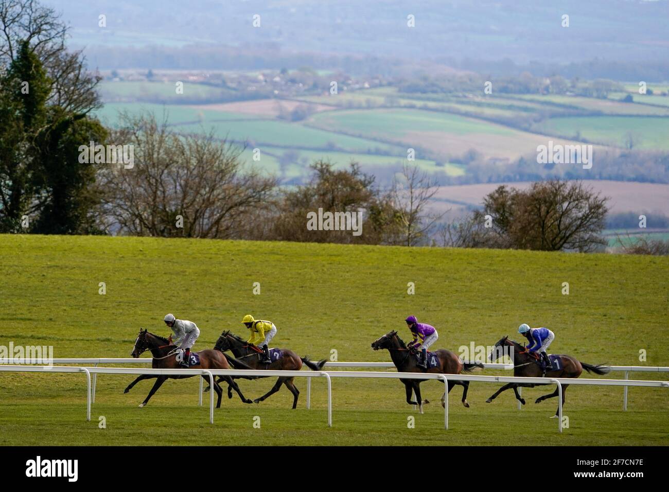Golden Flame ridden by jockey Adam Kirby (left) on their way to winning The CB Protection Event Specialists Maiden Stakes with Going Gone ridden by jockey Charlie Bennett second at Bath Racecourse. Picture date: Tuesday April 6, 2021. Stock Photo