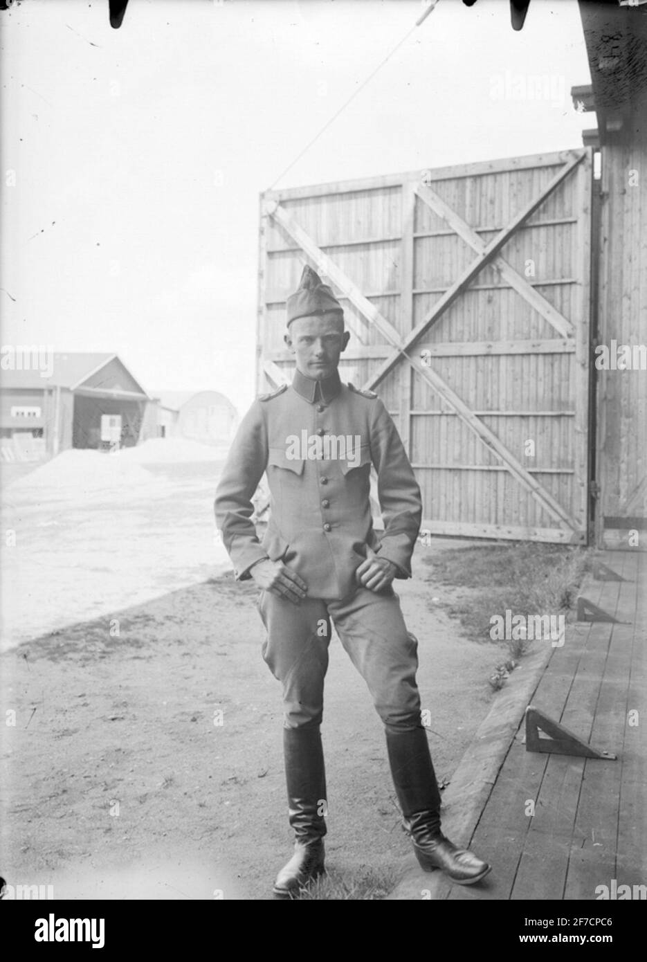 Portrait, Fänrik Portrait of Fänrik at the door of a hangar on the ore ...