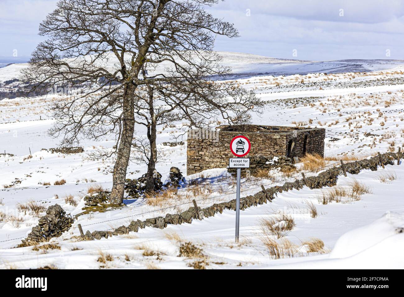 Winter in the Pennines - A lane blocked by snow near Coalcleugh, Northumberland UK Stock Photo