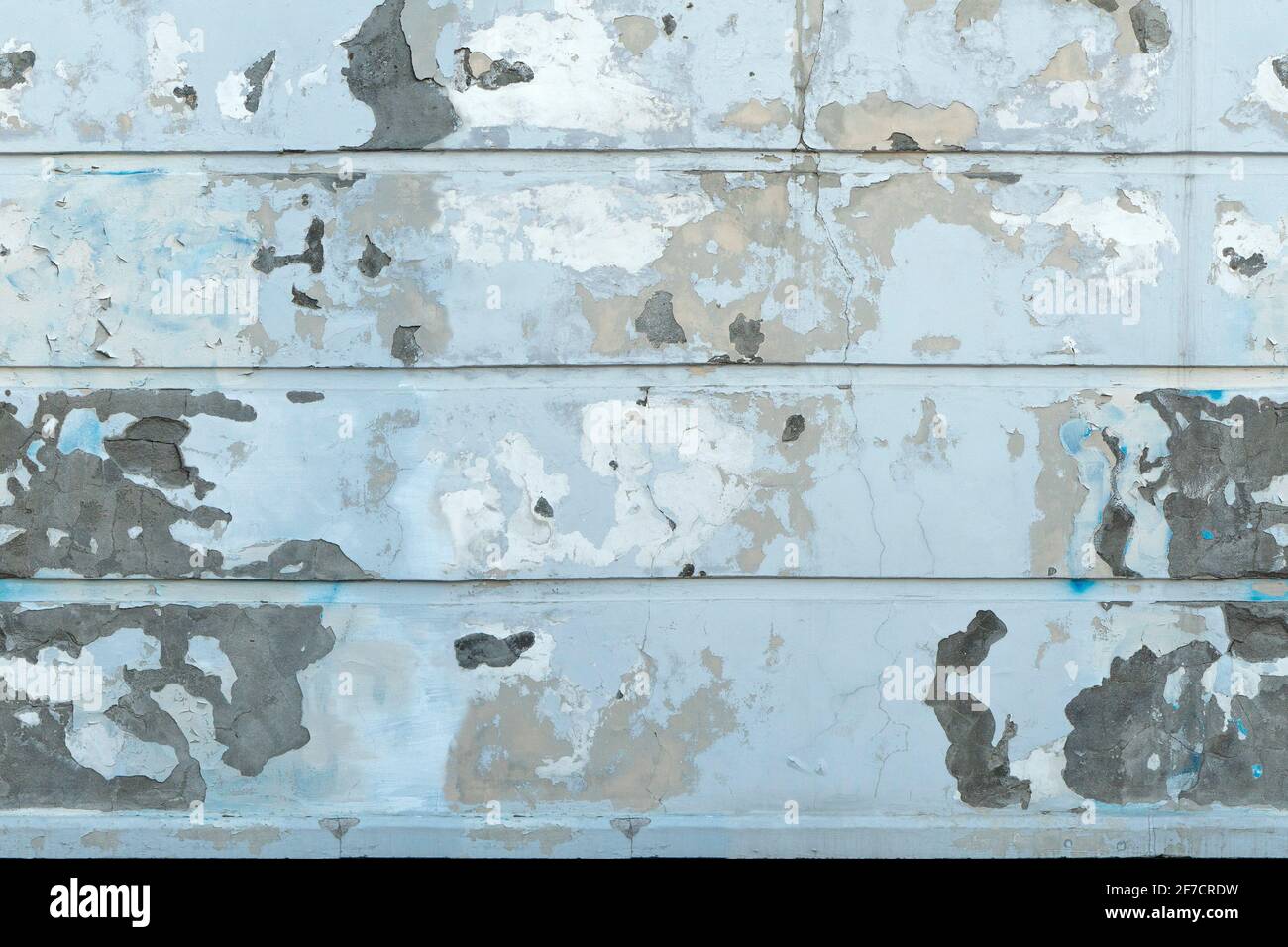 Seamless white wall with peeling plaster Stock Photo