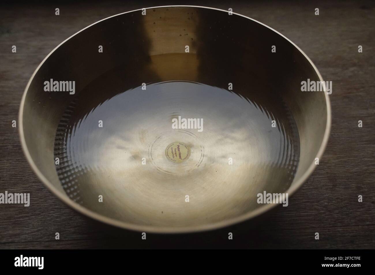 Singing bowl filled with water Stock Photo Alamy