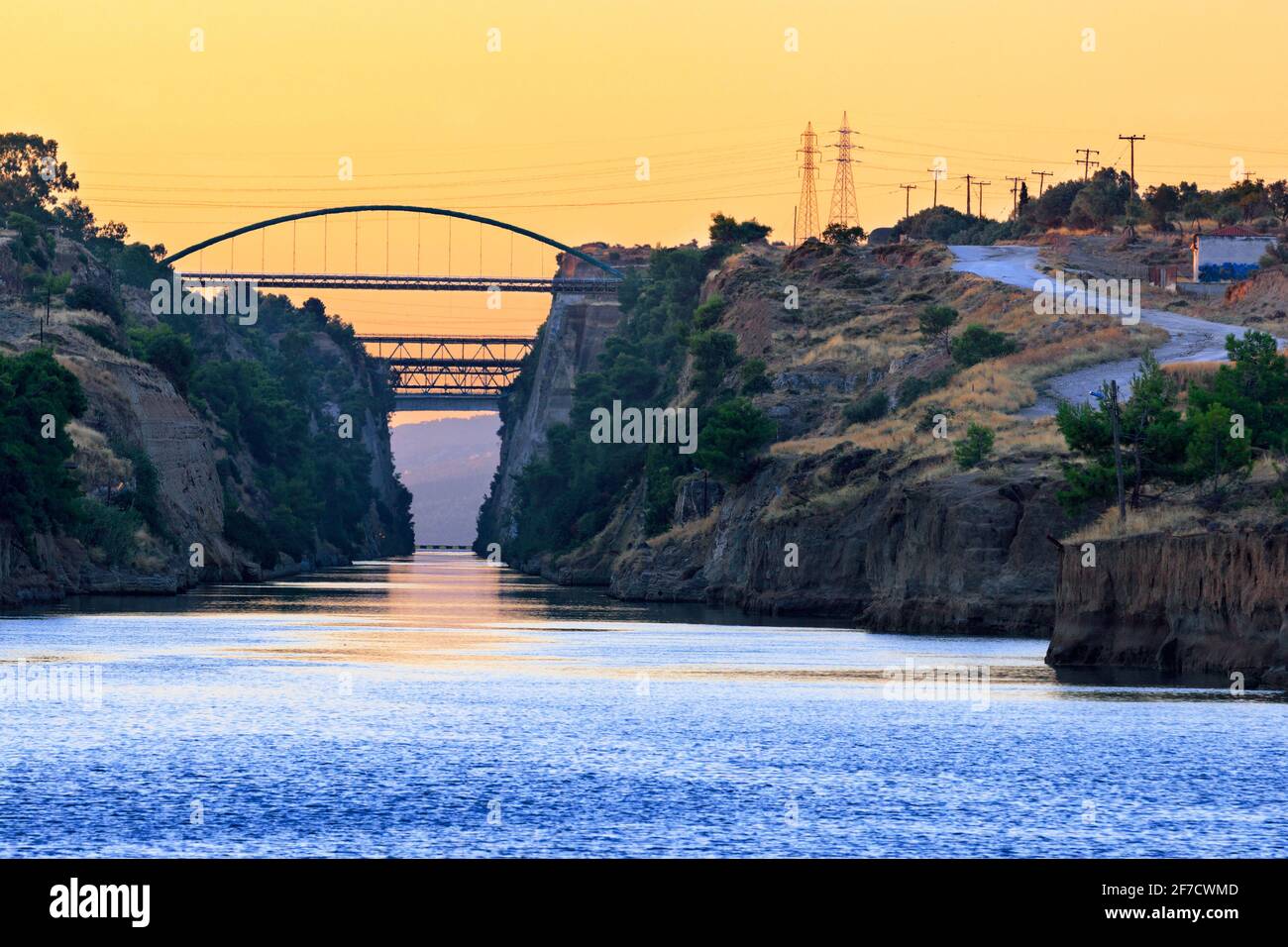 The Corinth Canal transport corridor between two seas in Greece in the early morning haze. Stock Photo