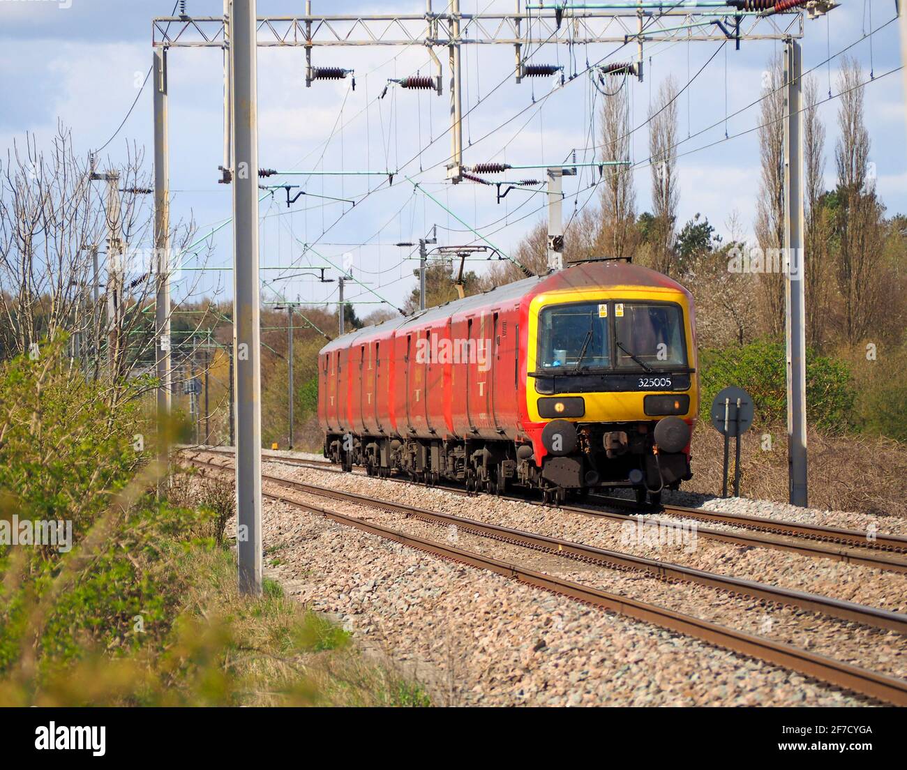 Class 325 Royal Mail train operated by DB Cargo passes Northampton on its way from Crewe to Princess Royal Distribution Centre, Willesdon Stock Photo