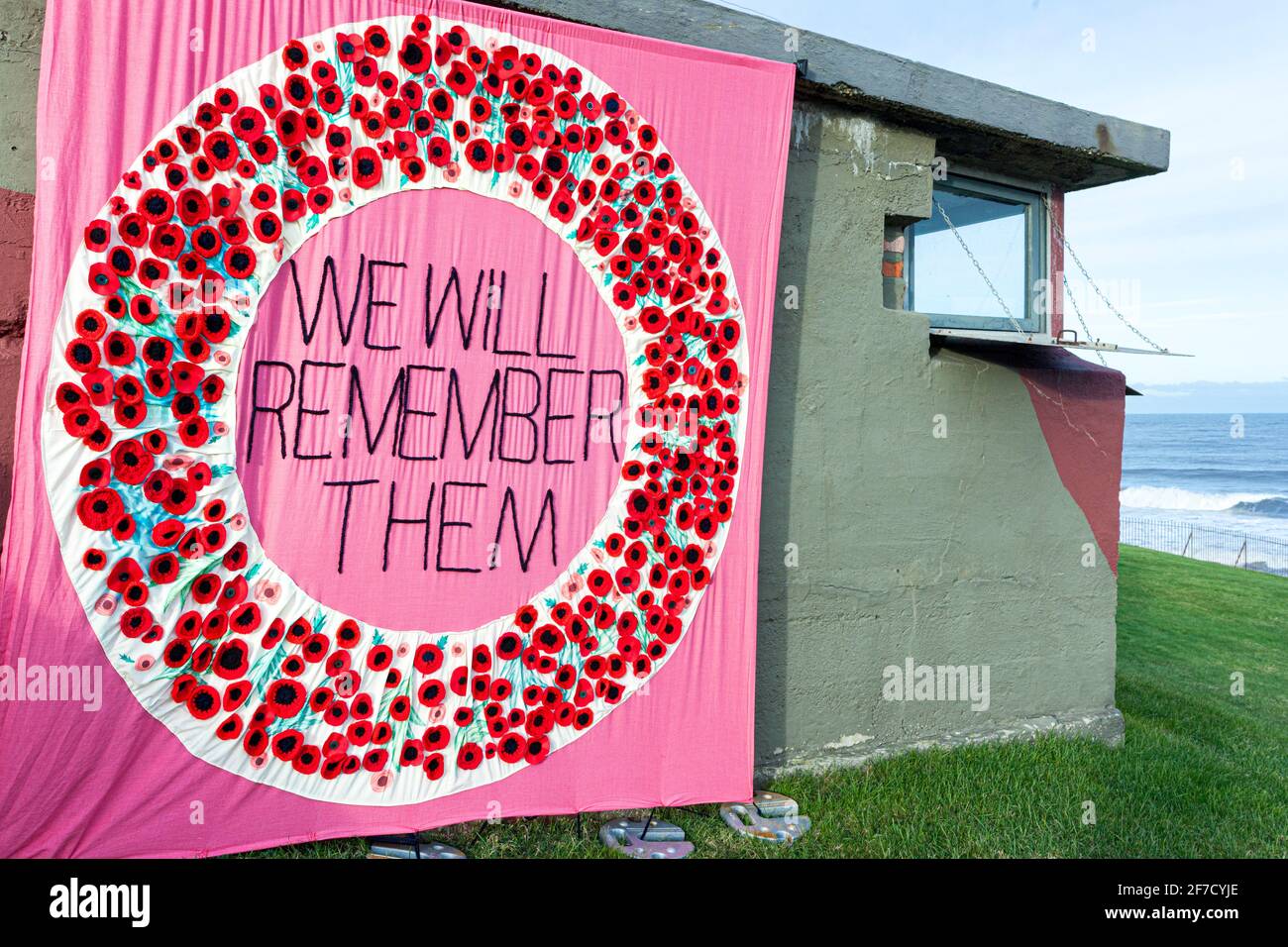 Remembrance Day (Poppy Day) banner at the Heugh Battery Museum, Hartlepool, County Durham UK Stock Photo