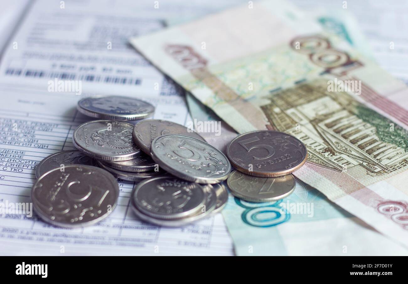 money coins and bills on documents. business concept Stock Photo - Alamy