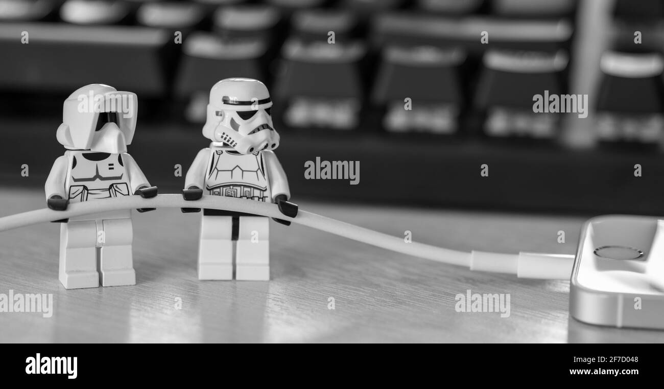 Lego Star Wars Figures Unplugging an iPhone Stock Photo