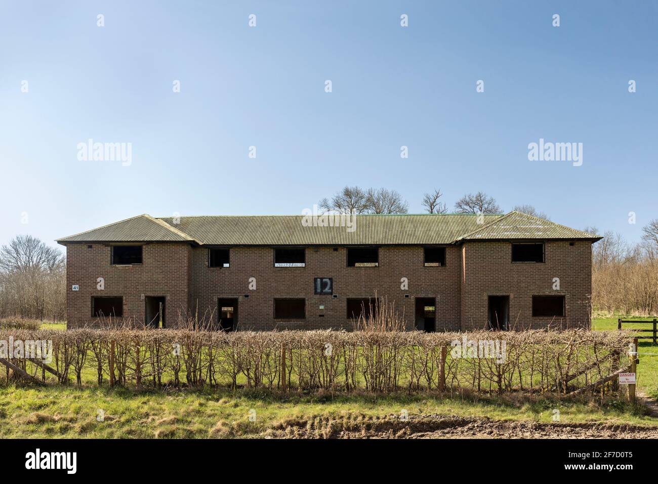 The council houses in the deserted village of Imber which now serves as the British Army training grounds, Salisbury Plain, Wiltshire, England, UK Stock Photo