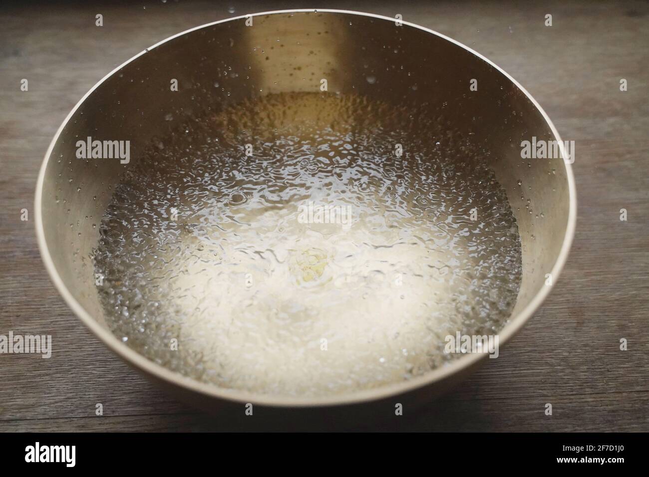 Singing bowl filled with water Stock Photo Alamy