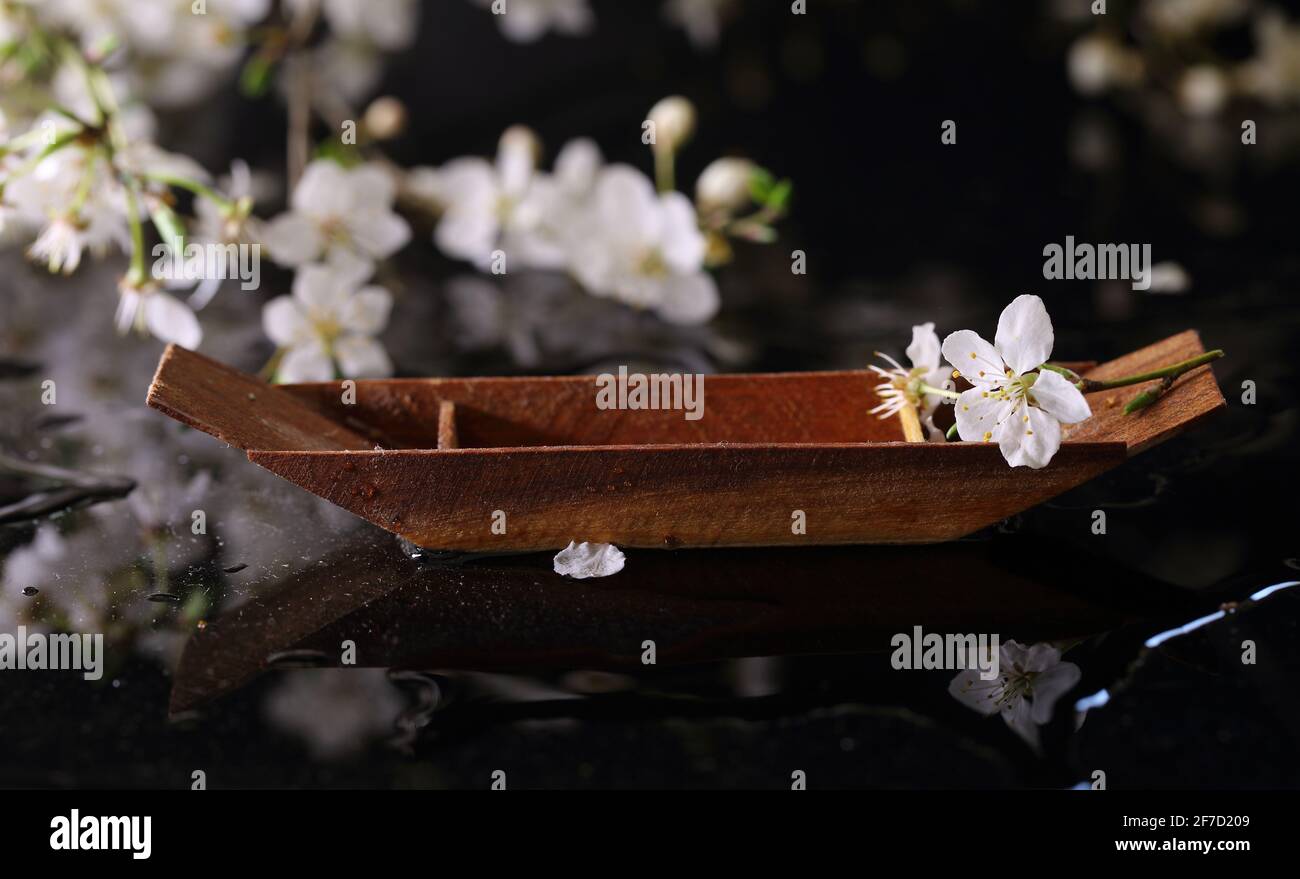 Still life with decorative wooden boat Stock Photo