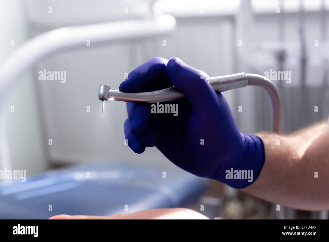 Drill in hand at the dentist. Dental equipment Stock Photo Alamy
