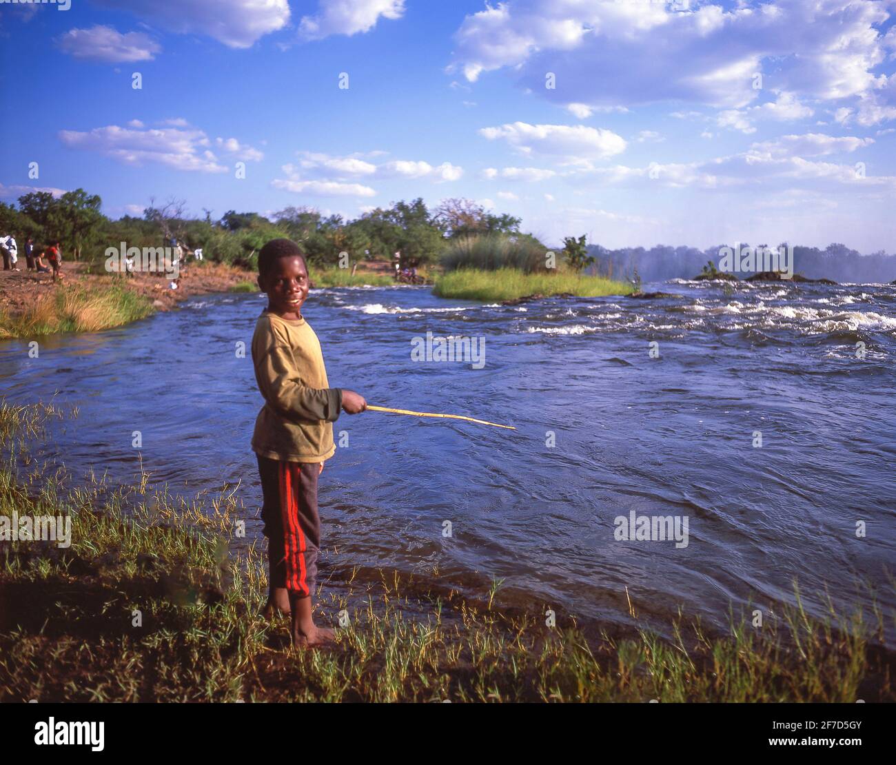 Boy fishing, Victoria Falls (Mosi-oa-Tunya), Livingstone, Southern Province, Zambia Stock Photo