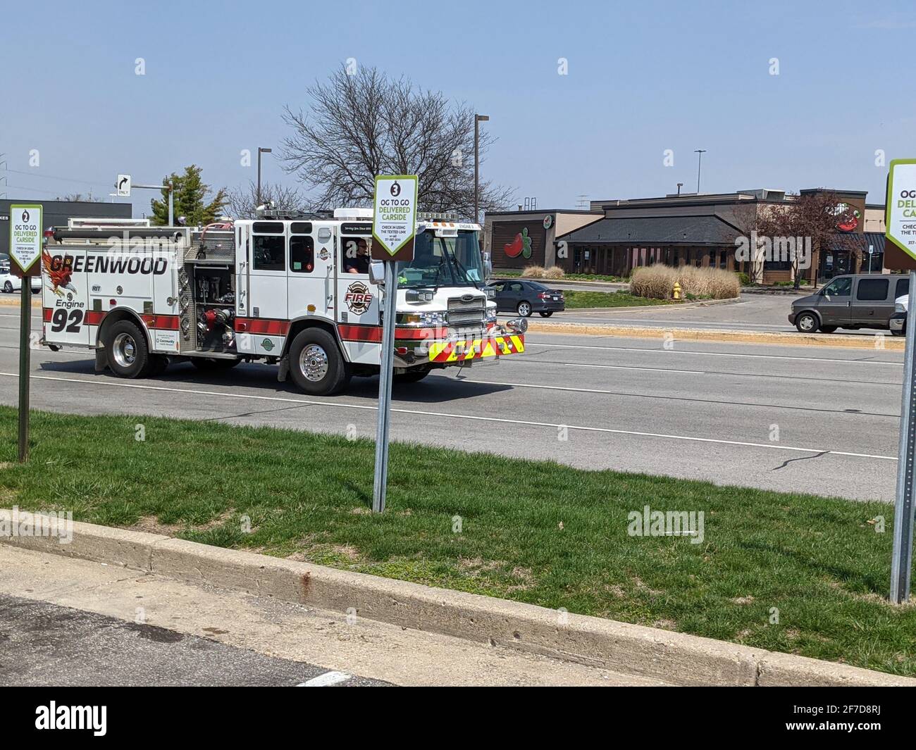 Fire Truck Driving By Stock Photo - Alamy