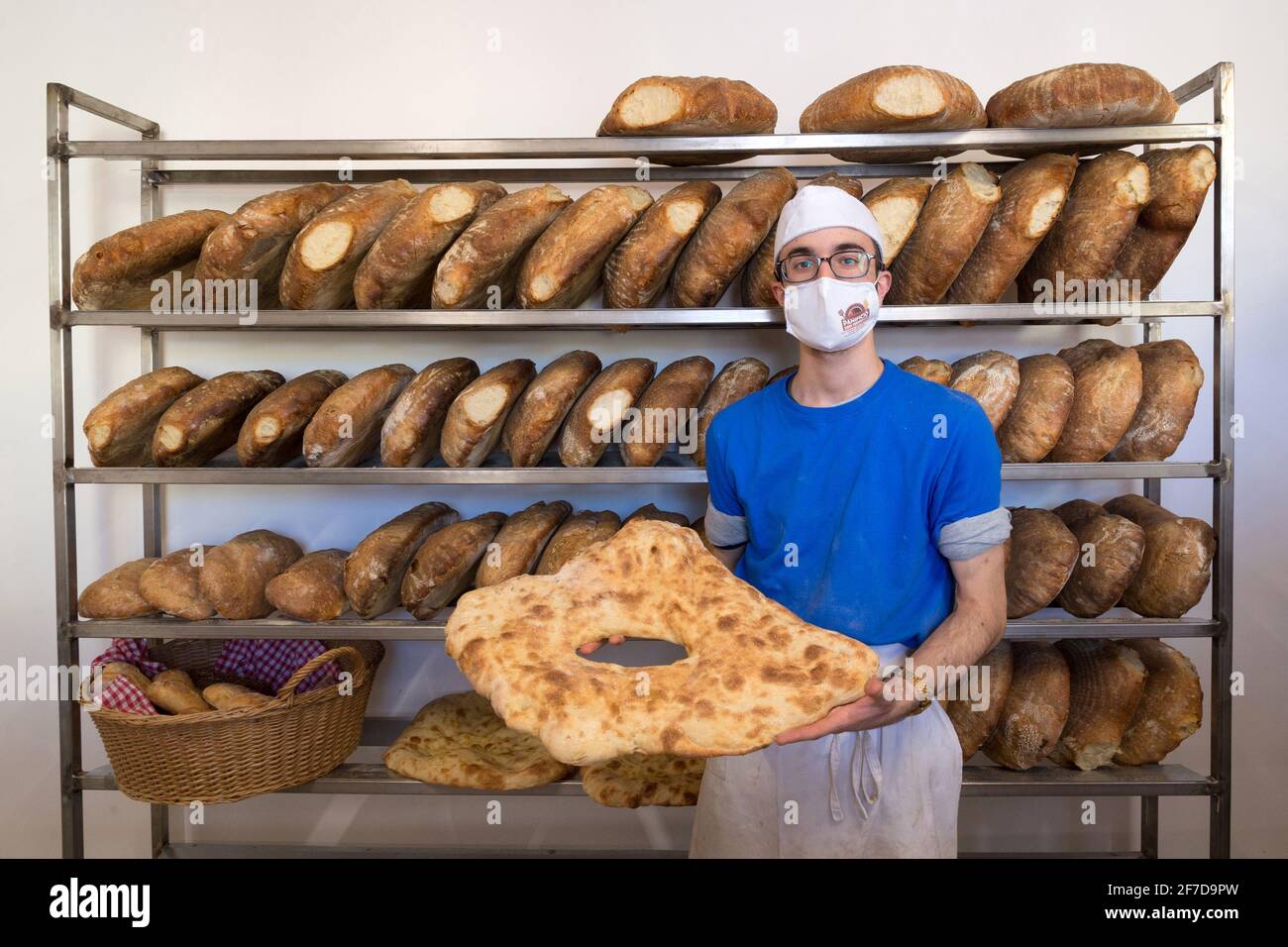 Trivento(CB),Molise Region,Italy:The son of the owner of the San Giuseppe bakery, located in the industrial area of Trvento (CB), with the typical foc Stock Photo