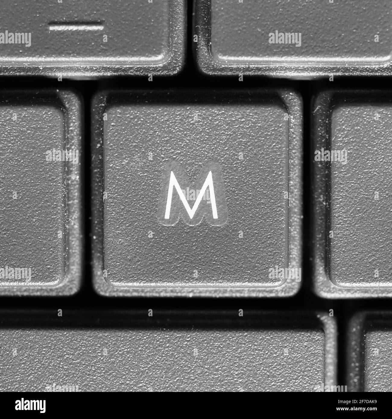 Letter M key on computer keyboard keypad Stock Photo - Alamy