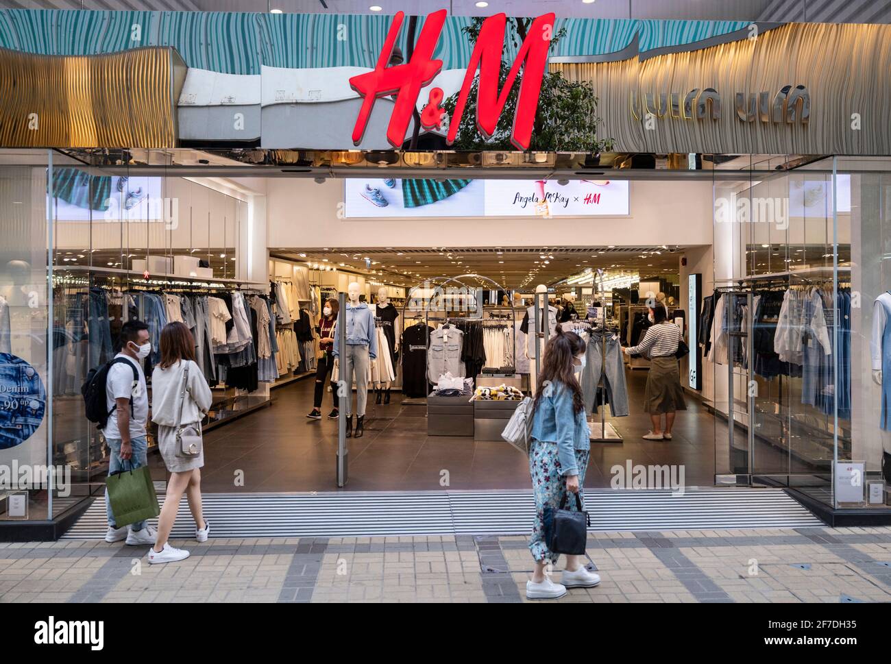 Hong Kong, China. 06th Apr, 2021. Pedestrians walk past the Swedish ...