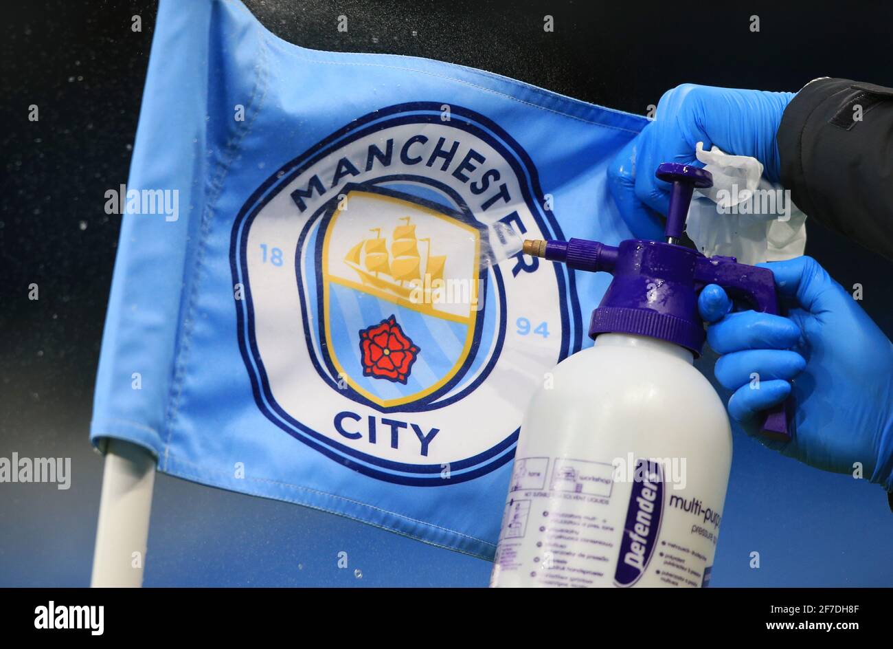 Manchester, UK. 06th Apr, 2021. Football: Champions League, Manchester City - Borussia Dortmund, knockout round, quarter-finals, first leg at Etihad Stadium. A corner flag with the Manchester City logo is disinfected before the match. Credit: Lindsey Parnaby/dpa/Alamy Live News Stock Photo