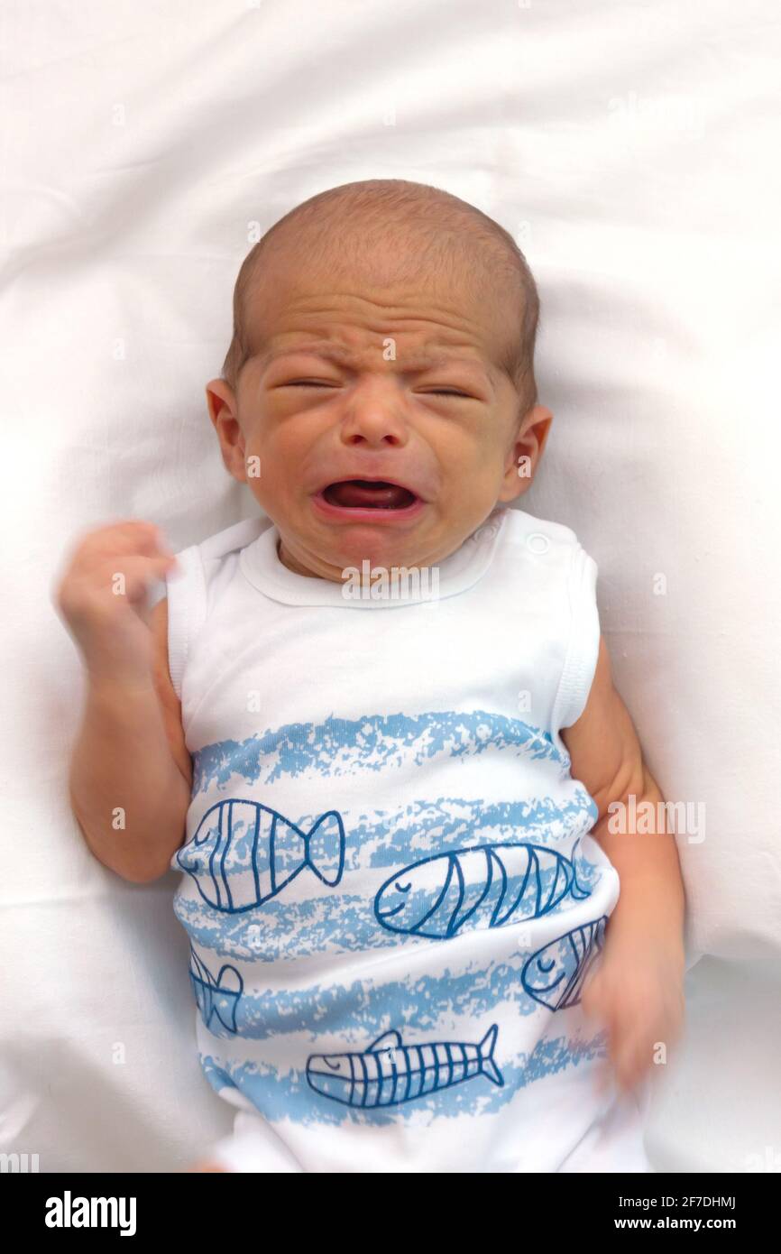 Crying Newborn Baby Very Cute Little Baby Boy Stock Photo Alamy